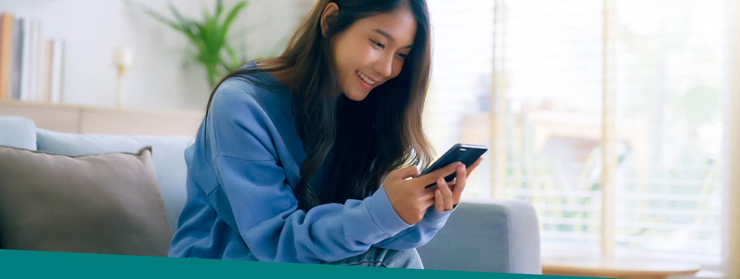 woman looking at phone
