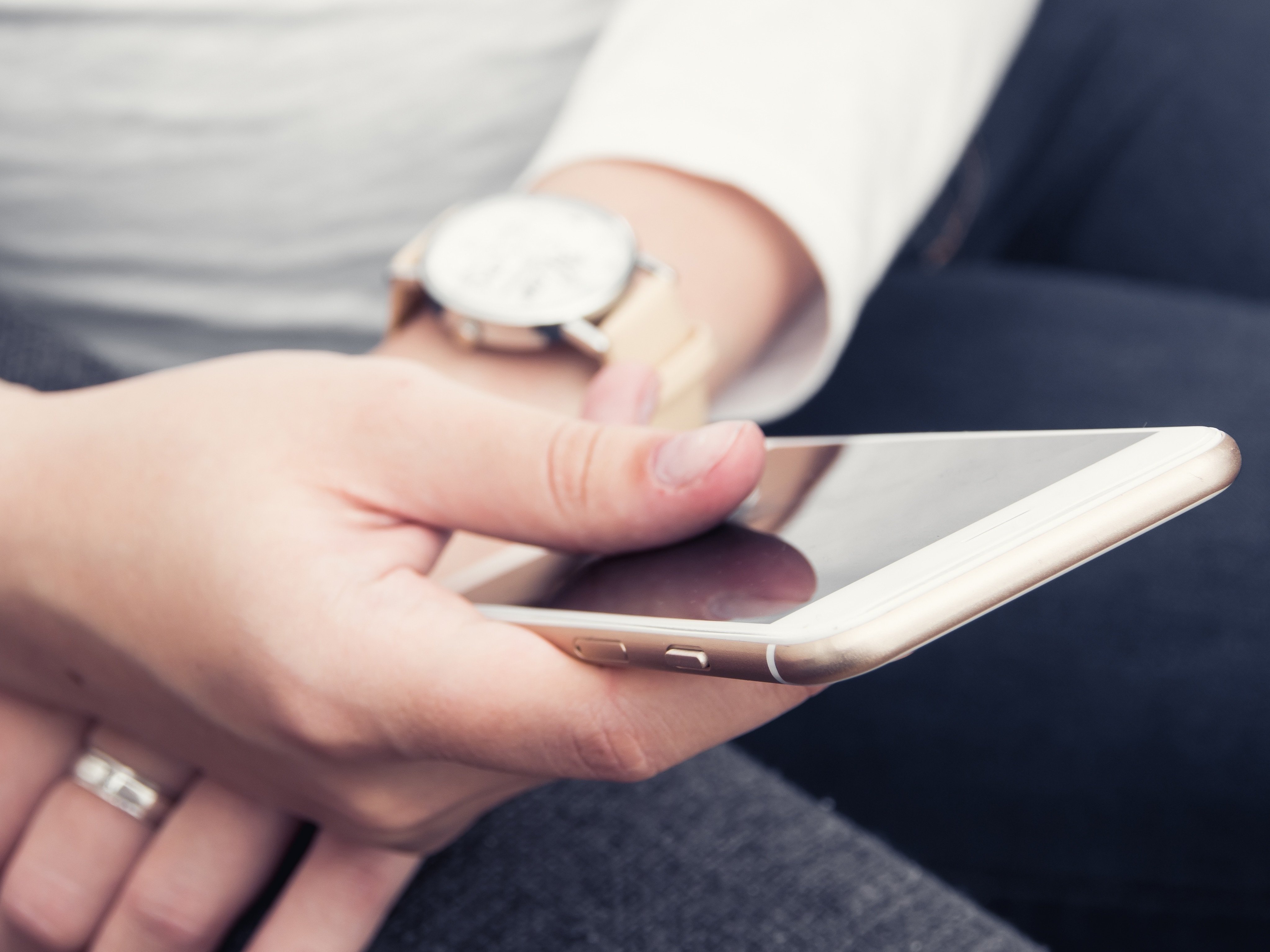 Hands holding cellphone